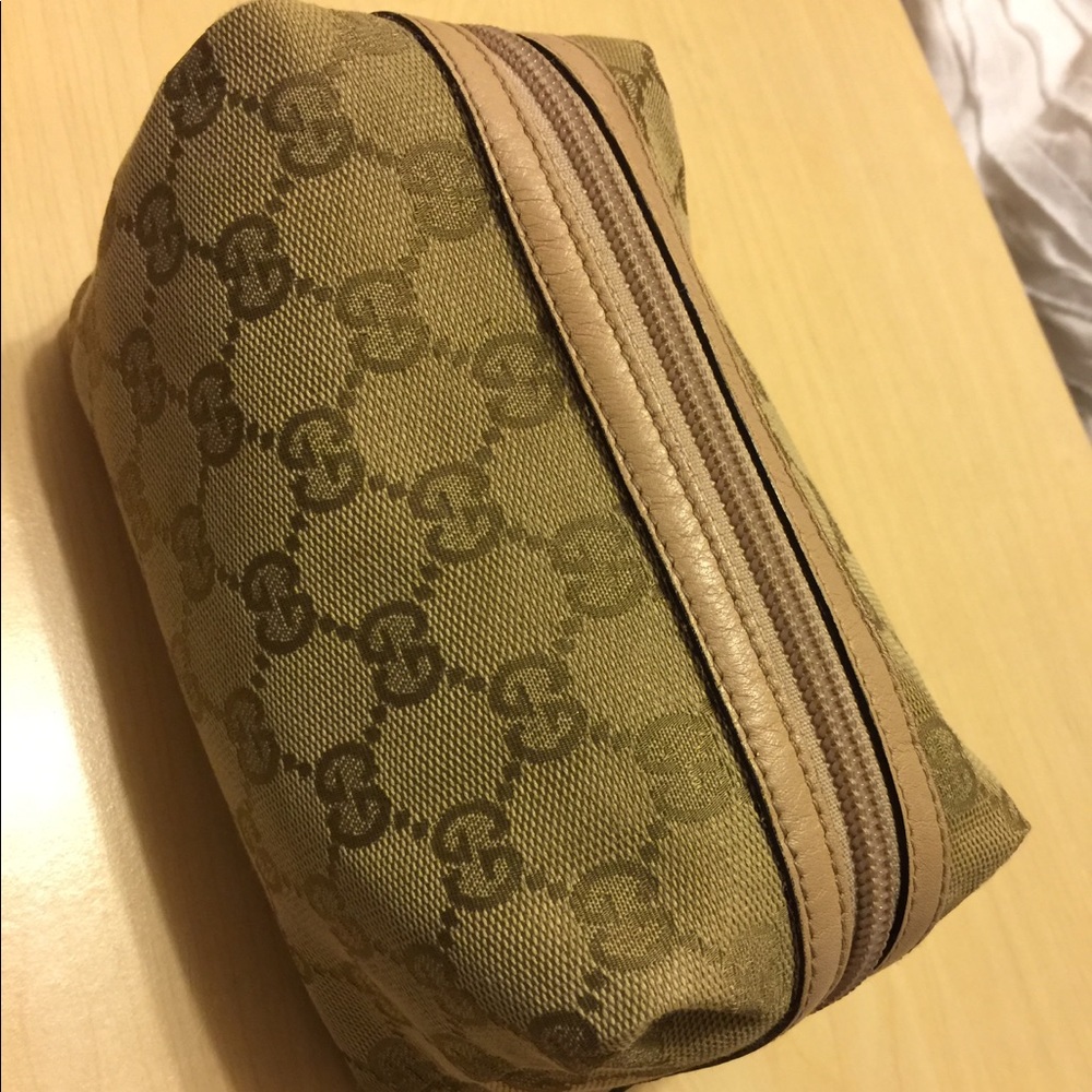 Gucci cosmetics pouch.